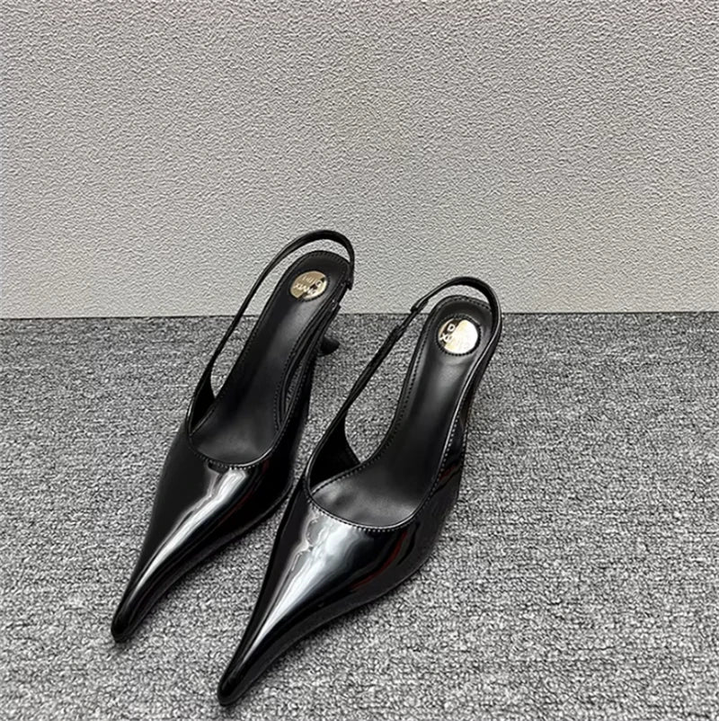Sculptural Patent Pumps