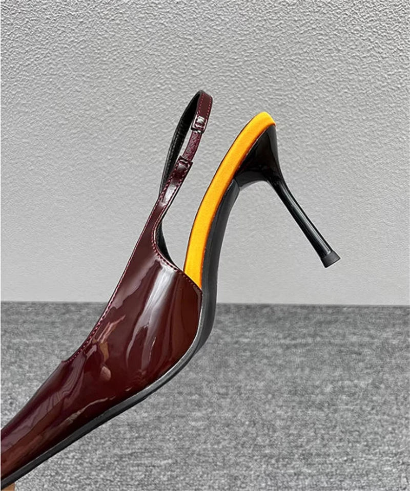 Sculptural Patent Pumps
