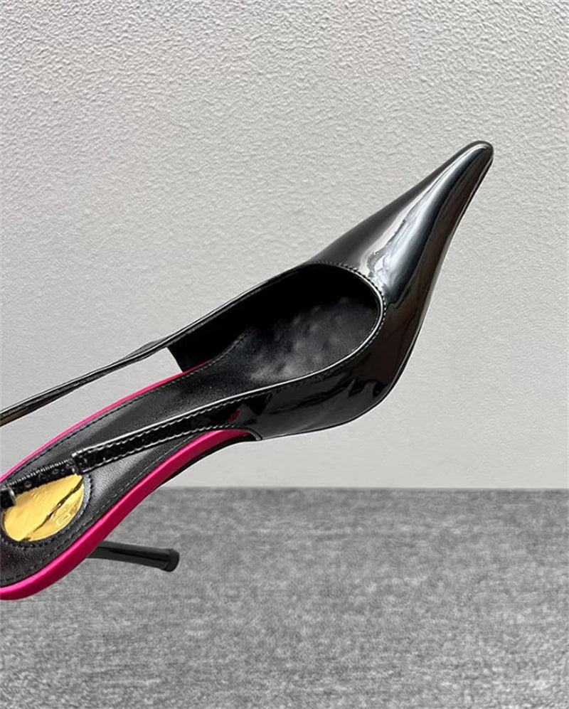 Sculptural Patent Pumps