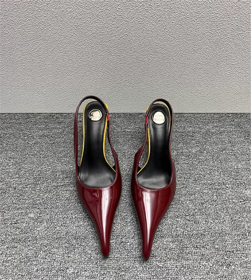 Sculptural Patent Pumps
