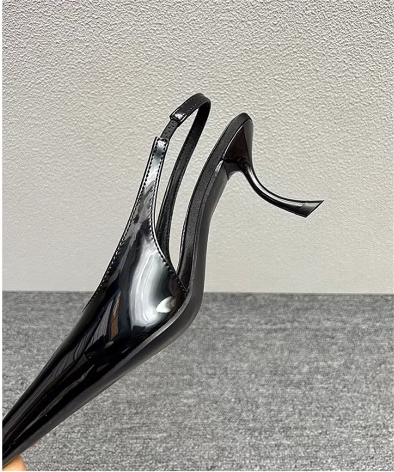 Sculptural Patent Pumps