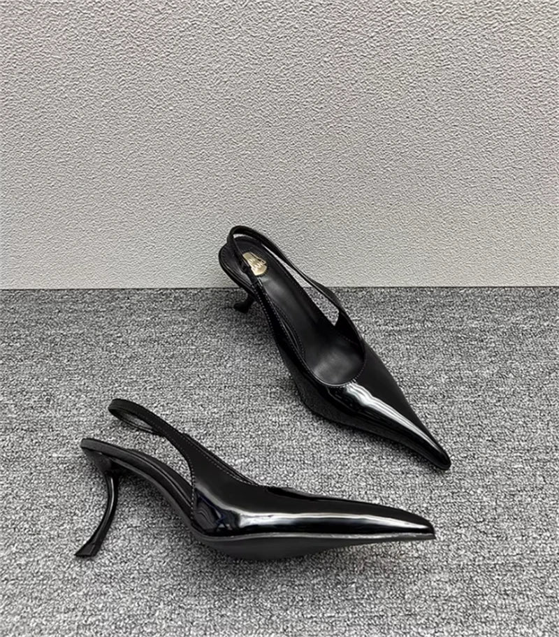 Sculptural Patent Pumps