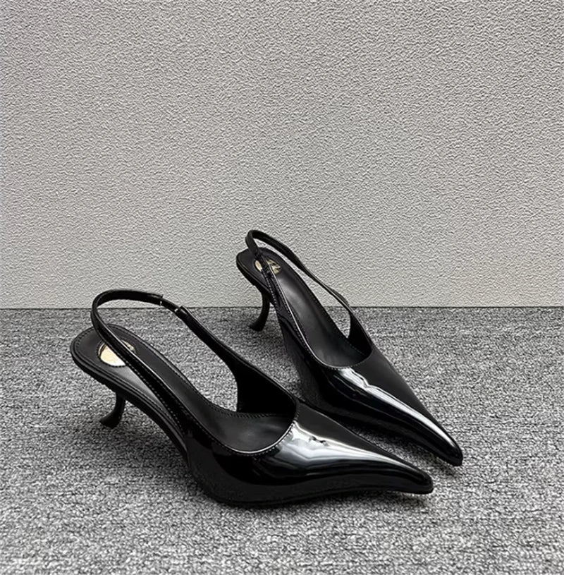 Sculptural Patent Pumps
