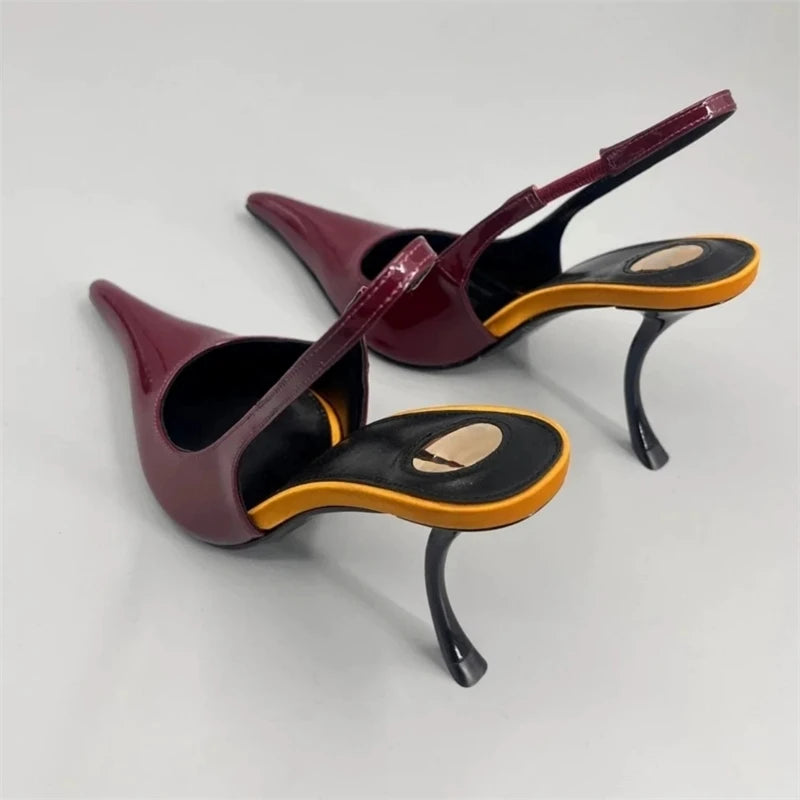 Sculptural Patent Pumps