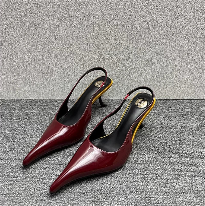 Sculptural Patent Pumps